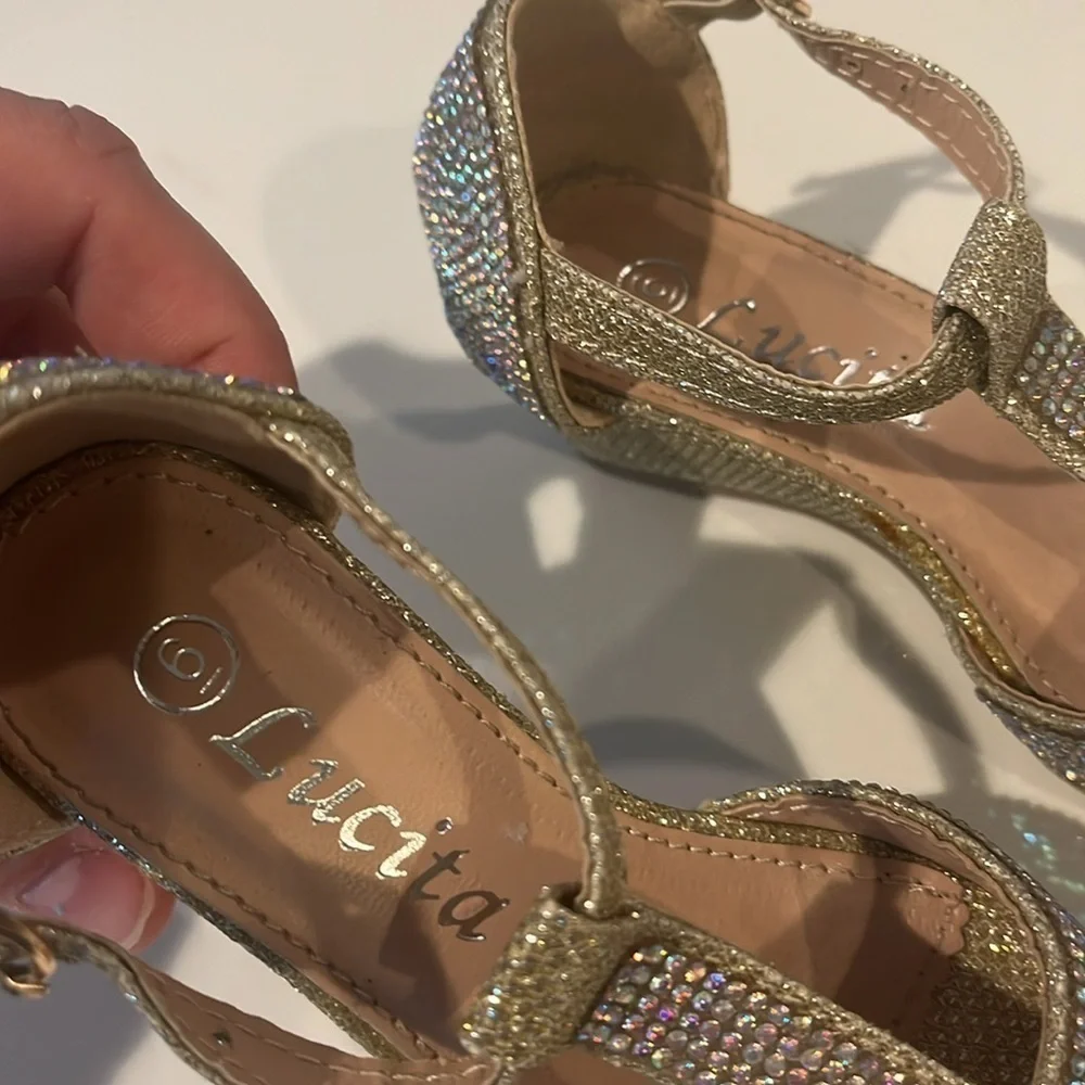 Gold sequined children’s dress shoes